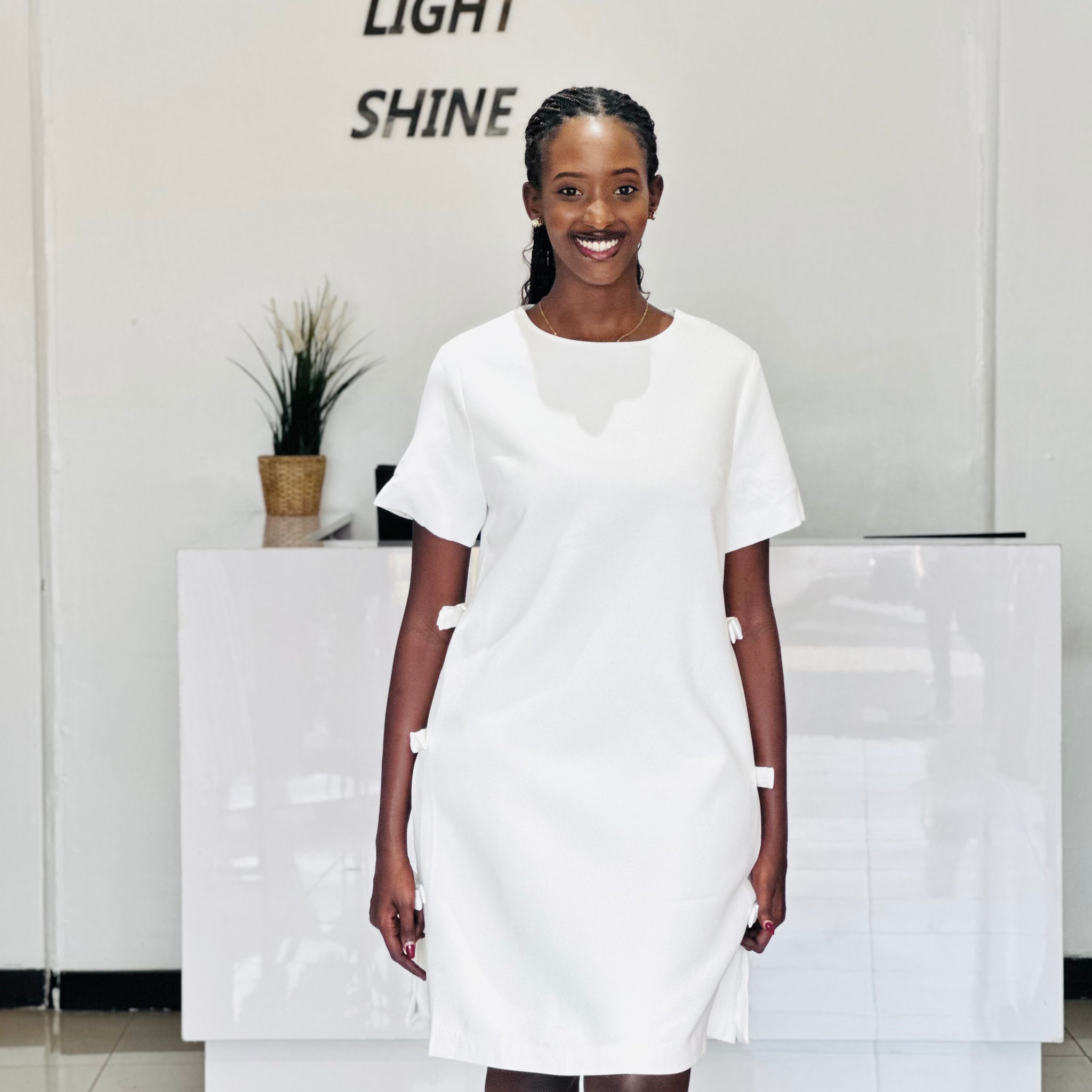 Dress white mid-length with bow