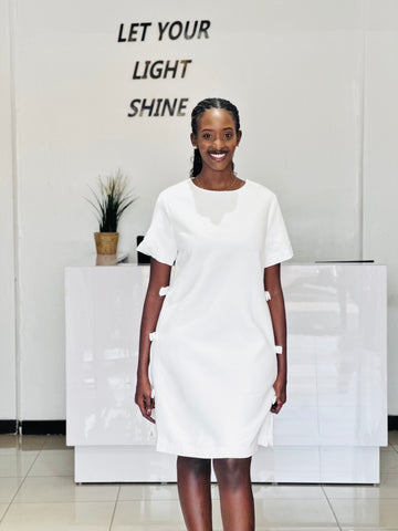 Dress white mid-length with bow